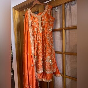 Orange Punjabi suit with golden embroidery and palazzo pants